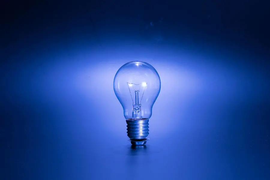 Photo of a simple lamp with a blue background for electrical engineers' profile and wallpaper