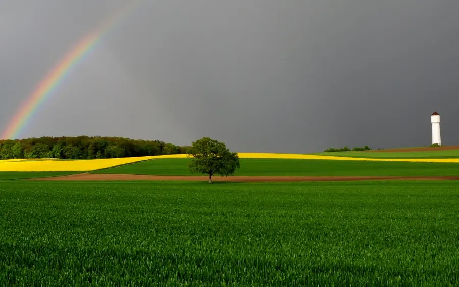 Stock photo of a beautiful and spectacular view and a dreamy rainbow