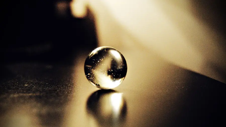 The simplest modern background photo of a glass crystal ball and ball 