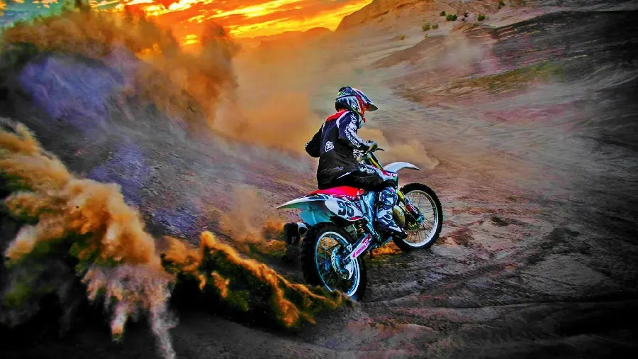 Dust Kicking Up Dirt with Motocross on a Desert Track in HD Quality