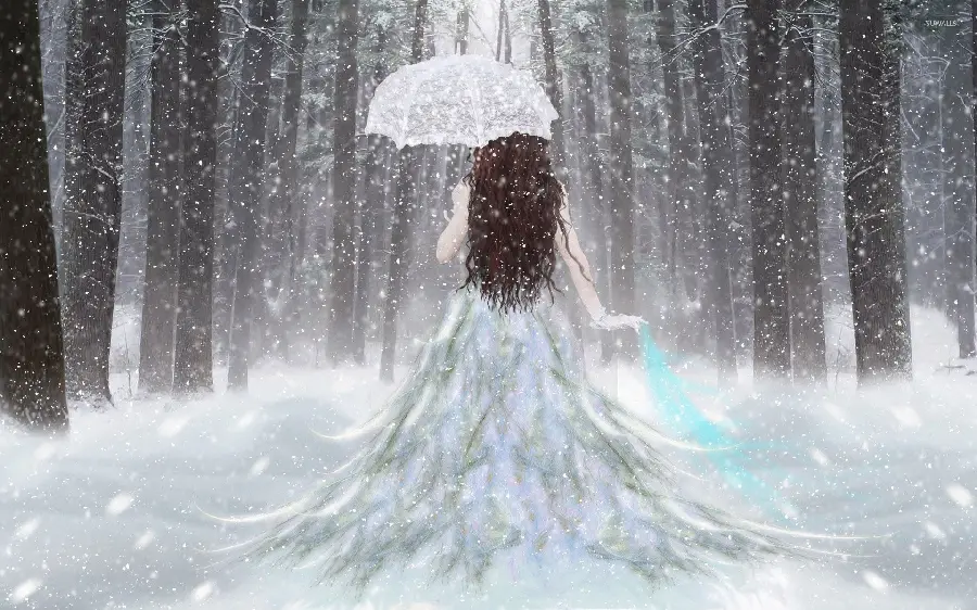 Girl photo in a beautiful wedding dress with a snow umbrella in winter