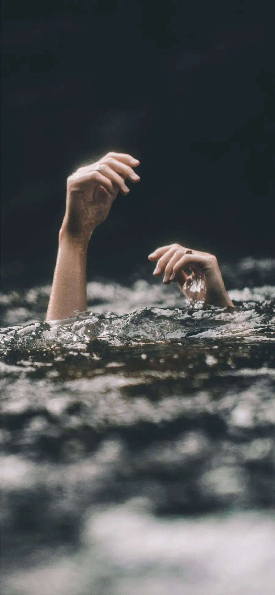 Sad and lonely profile picture of a man drowning in water