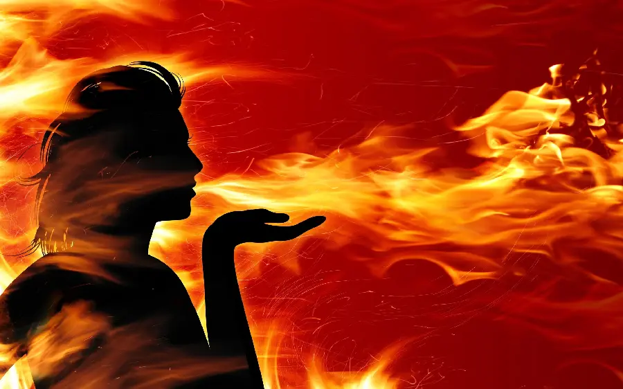 Wallpaper and background 2024 with a design of fiery breaths of a sad woman for the profile 