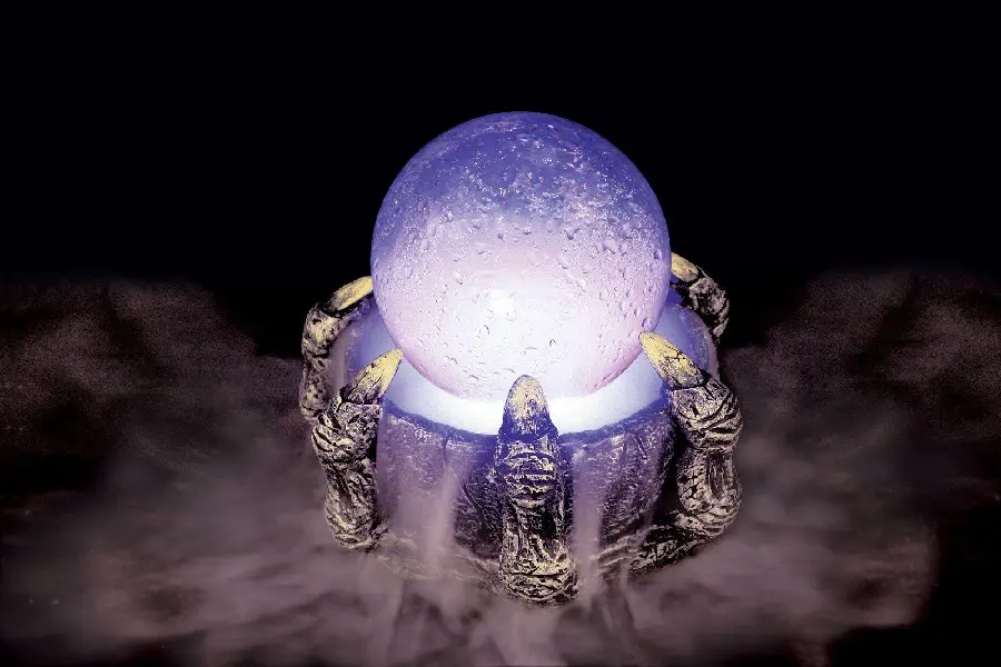 Profile photo of a white glass magic crystal ball 