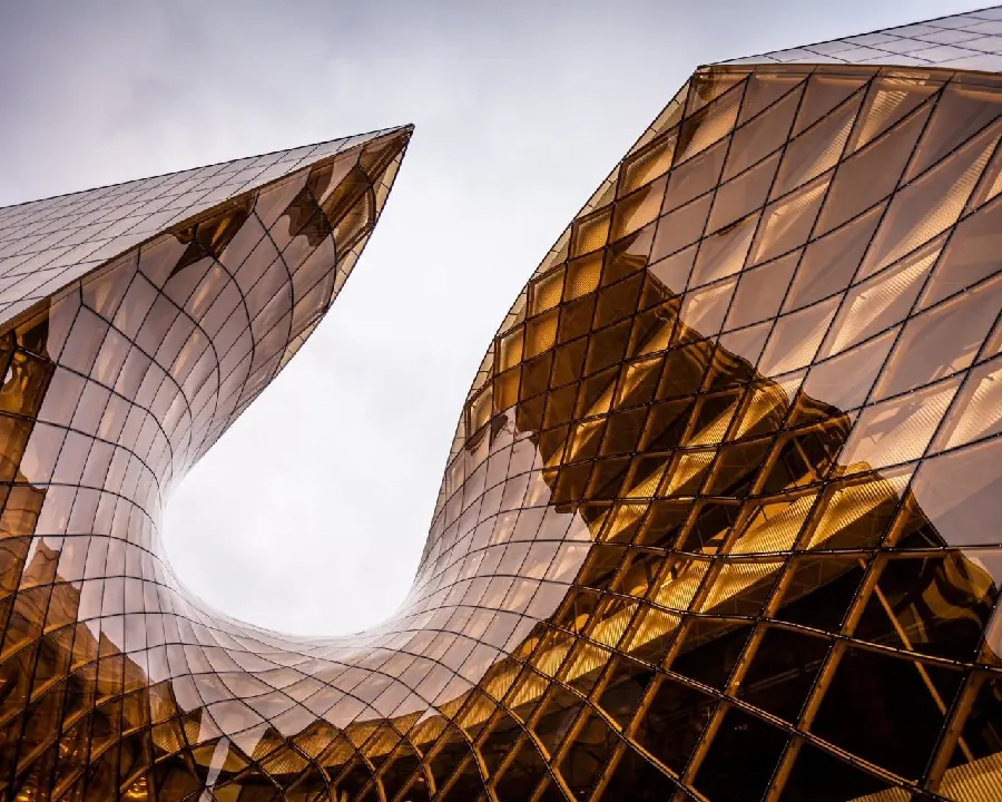 Glass reflection wallpaper in modern geometric orange building