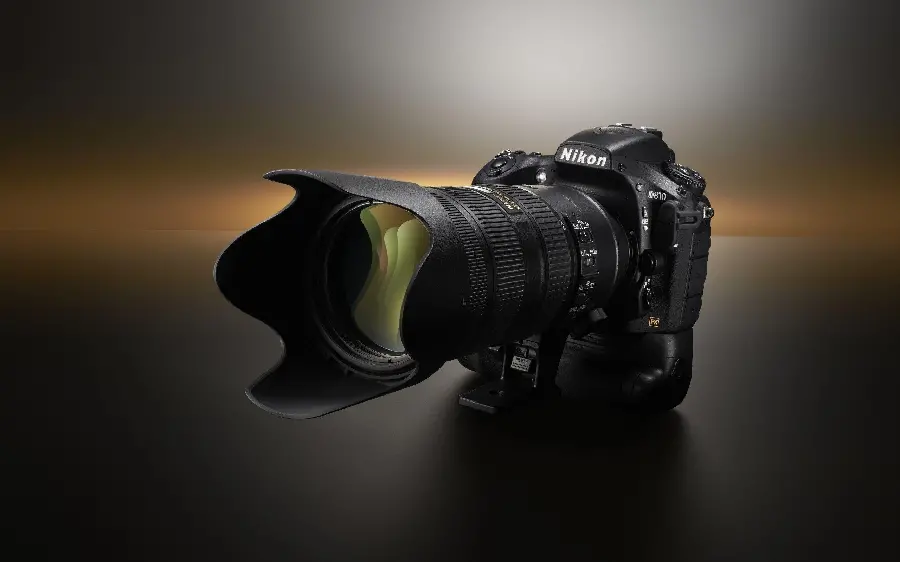 Wallpaper of Nikon D810 camera on background folio 