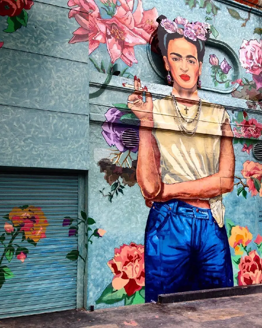 Creative mural painting of Frida Kahlo for the background of the iPhone