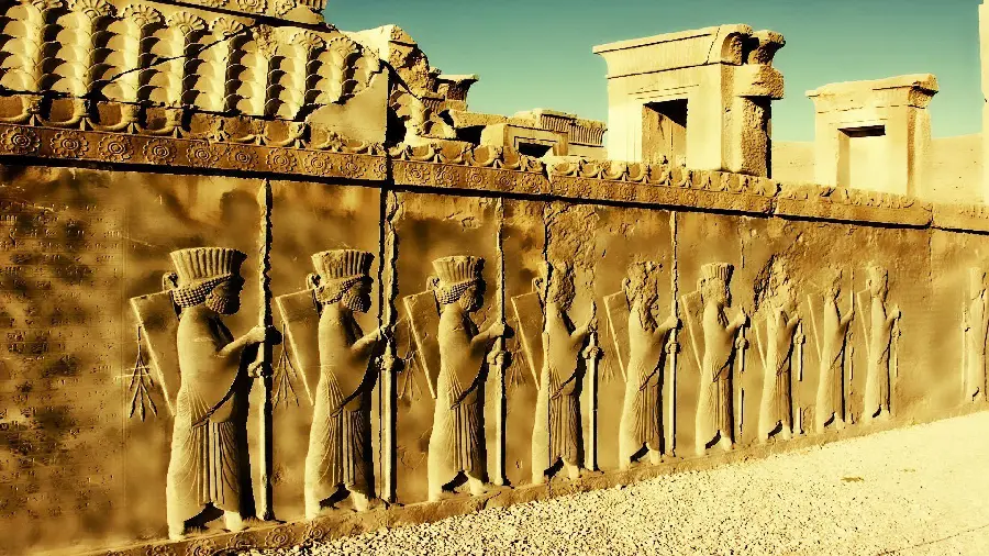 A spectacular photo of the carved motifs on the walls of Persepolis in the Iranian architectural style