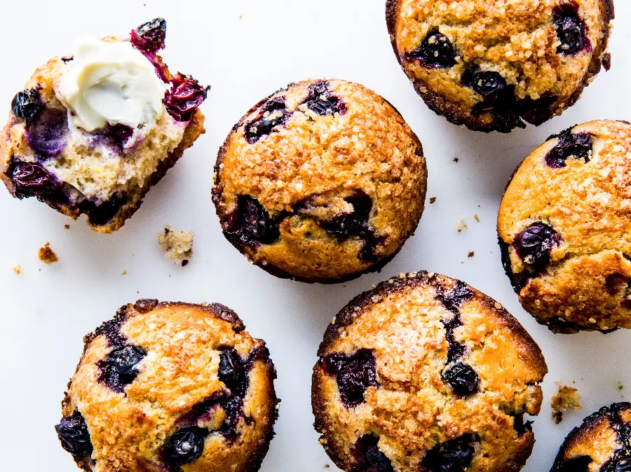 Special and stylish wallpaper of a real blueberry muffin with a white background
