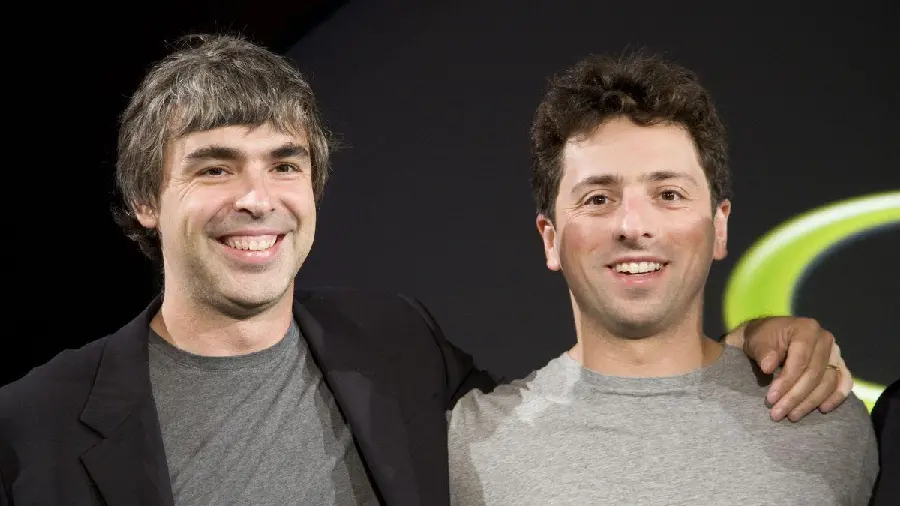 Background photo of Larry Page and Sergey Brin with a black background