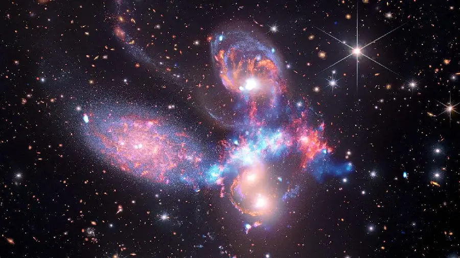 Beautiful photo of the bright space with colored lights by the James Webb Space Telescope