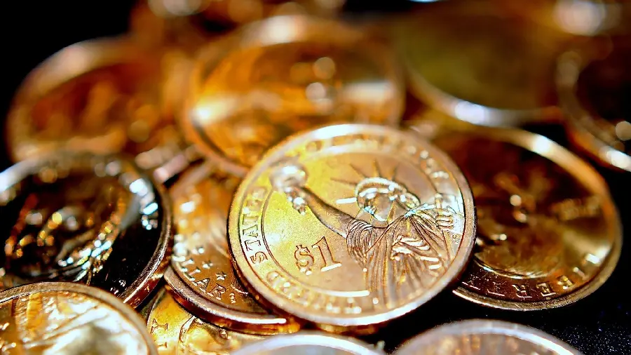 Stylish and attractive wallpaper of a golden American dollar coin