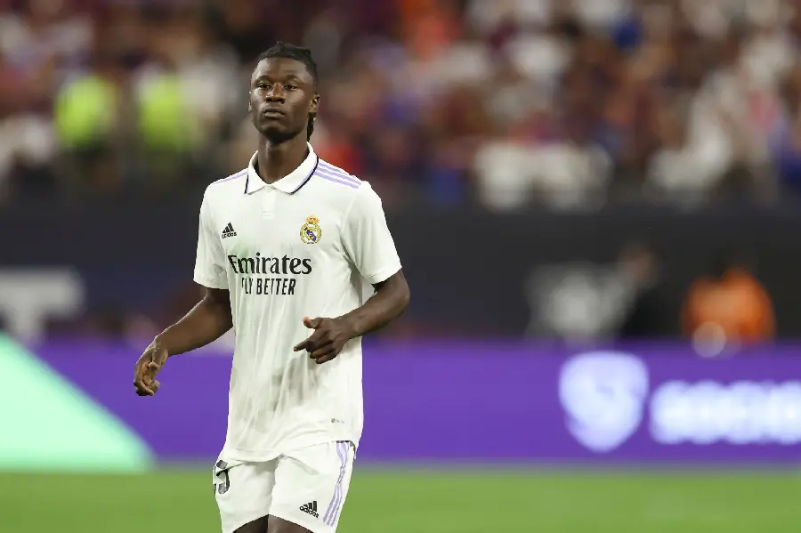 Background photo of Eduardo Camavinga, a prominent player of Real Madrid and the world