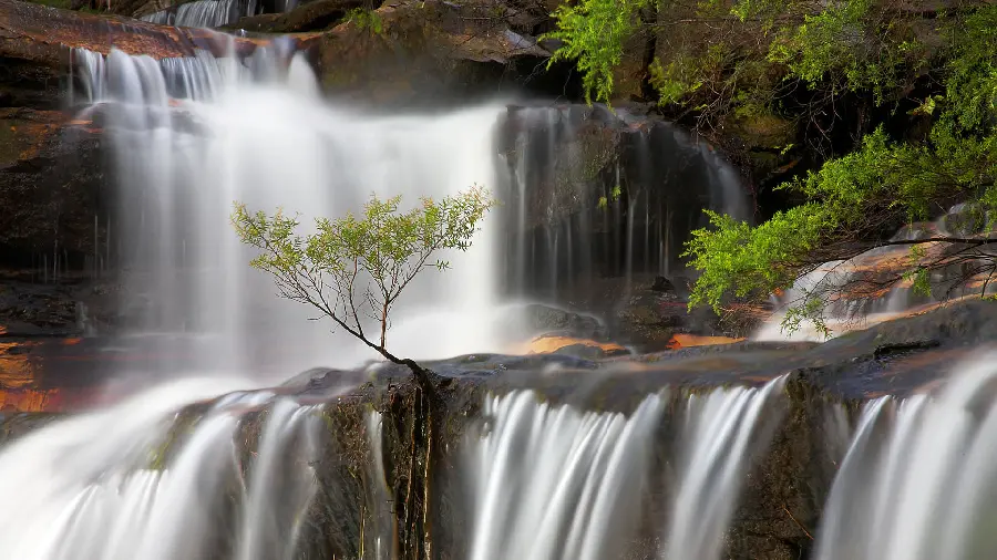 Download Amazing and Roaring Waterfall Nature Photo Suitable for Backgrounds 