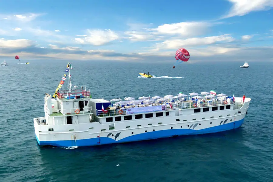 Wallpaper of a cruise ship in the open and clean waters of Kish Island