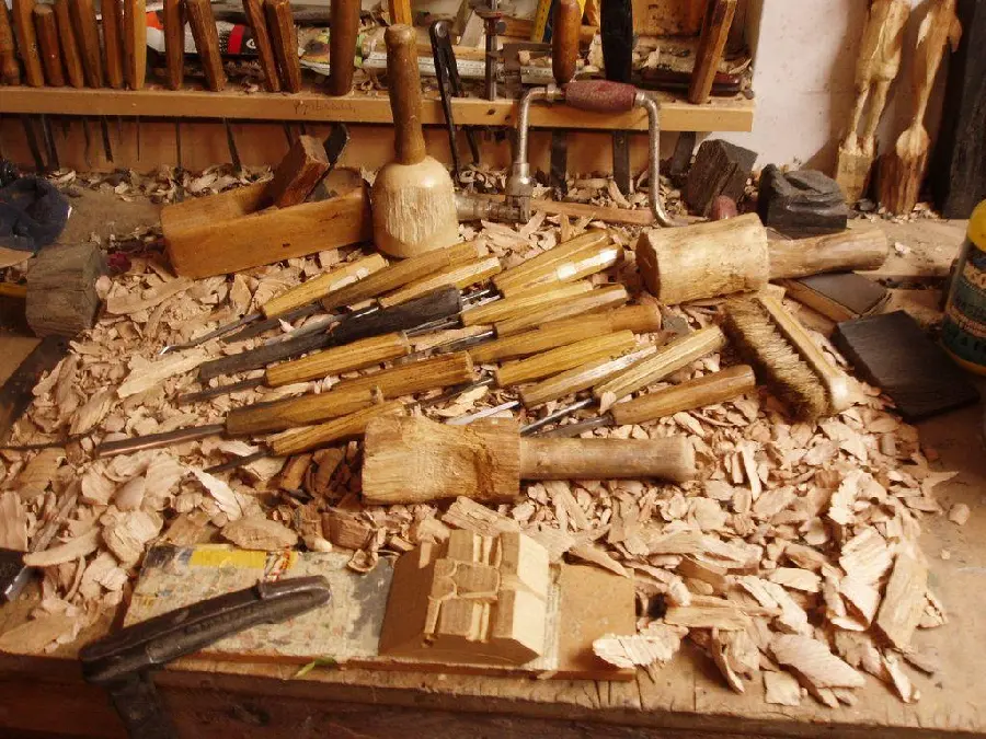 Photo of a busy carpentry workbench with a good sense of the smell of fresh wood