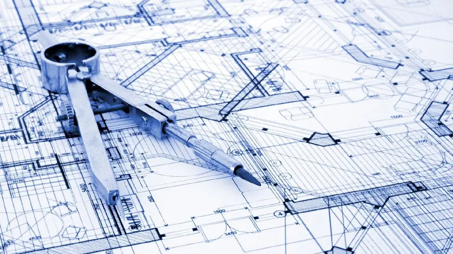 Image of a precise and engineering building plan with a compass and special drawing equipment 