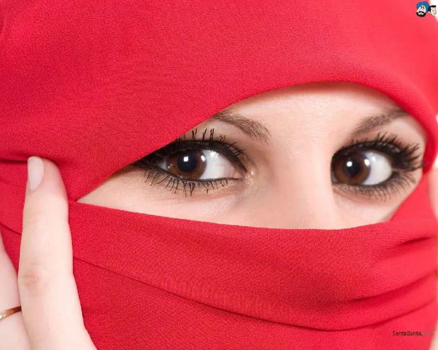 A picture of a girl with a veil and a red scarf for a girl's profile