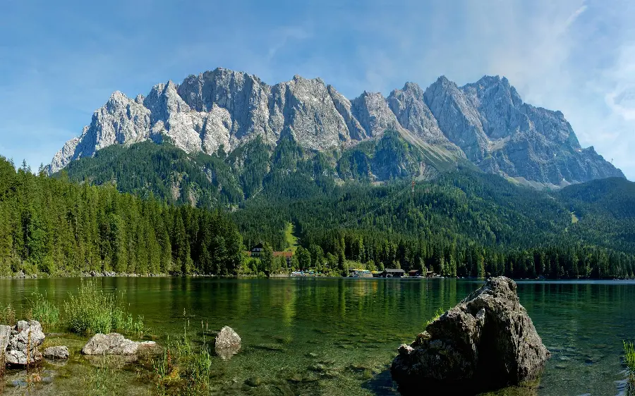 Download a very impressive and enjoyable photo of a full-water lake in the Swiss Alps