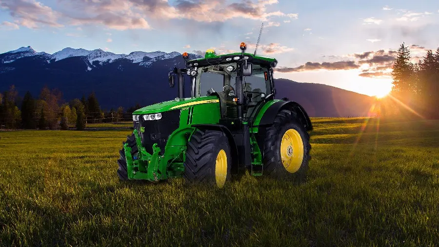 Green tractor stock photo for organic and agricultural products promotion