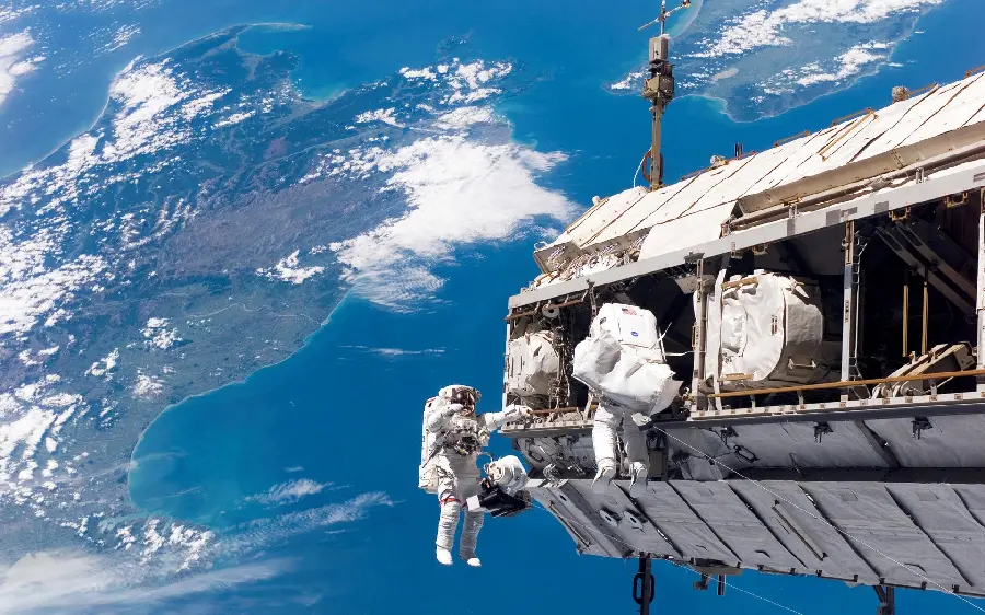 Interesting and spectacular photo of a satellite near the Earth suitable for Windows background