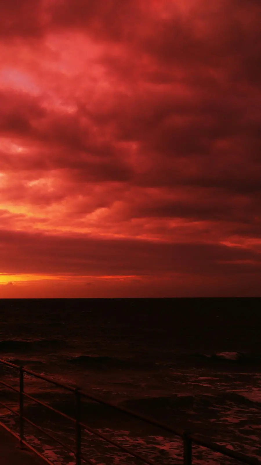 Dark and scary wallpaper of the bloody and red sky for the Galaxy A05s phone