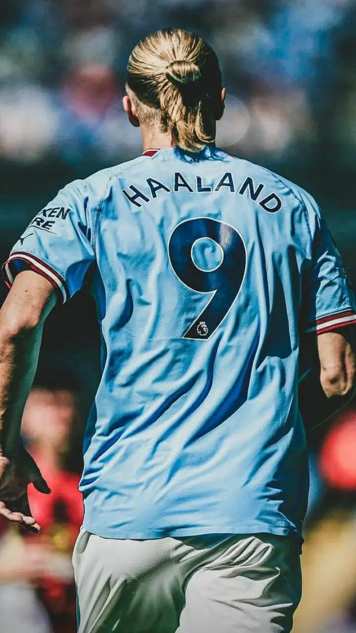 Erling Haaland Wallpaper with No. 9 Shirt and Long Hair
