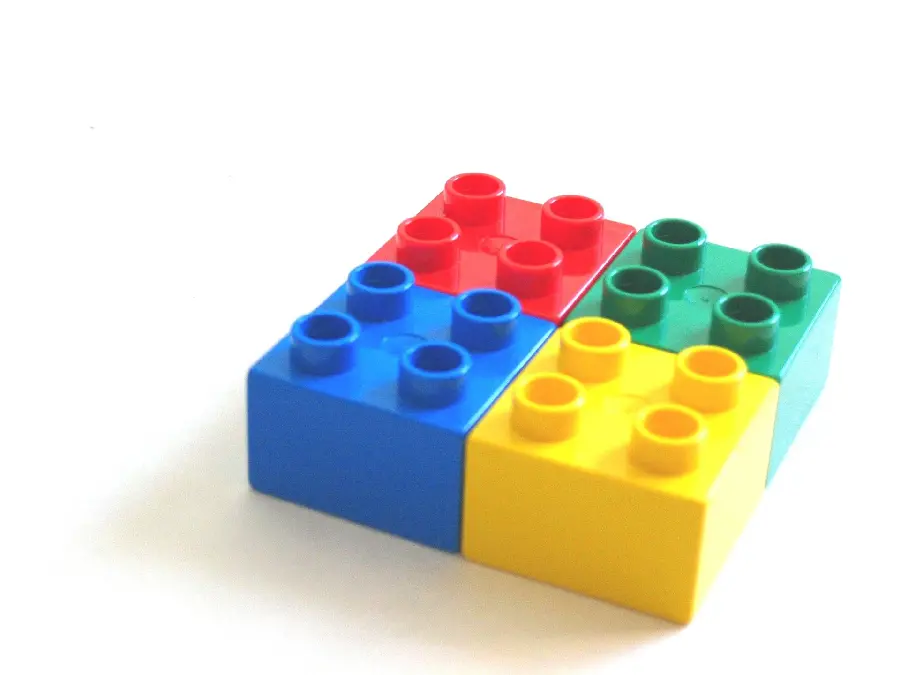 Colorful Building Block Wallpaper on White Background