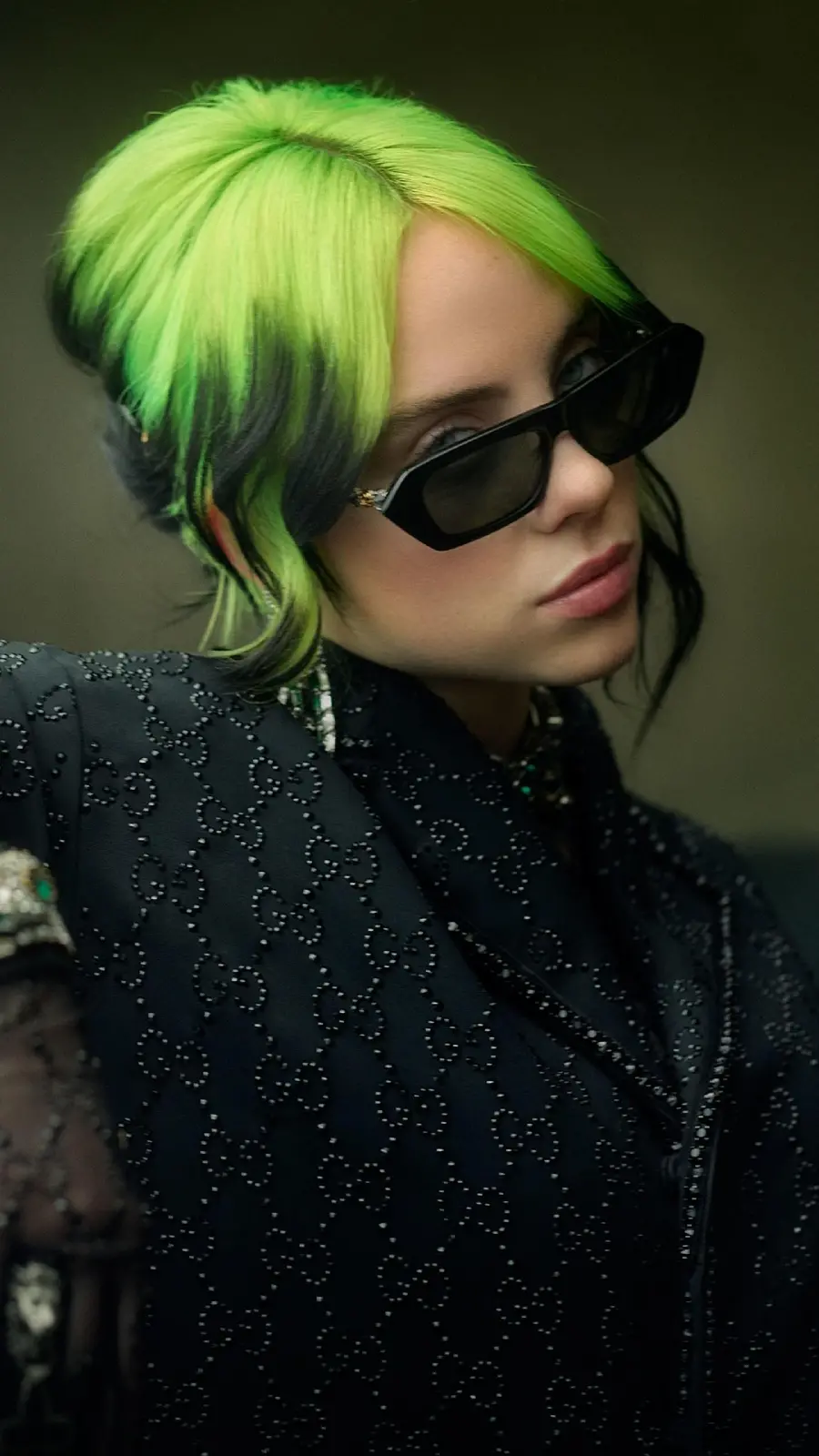 Billie Eilish with stylish green hair