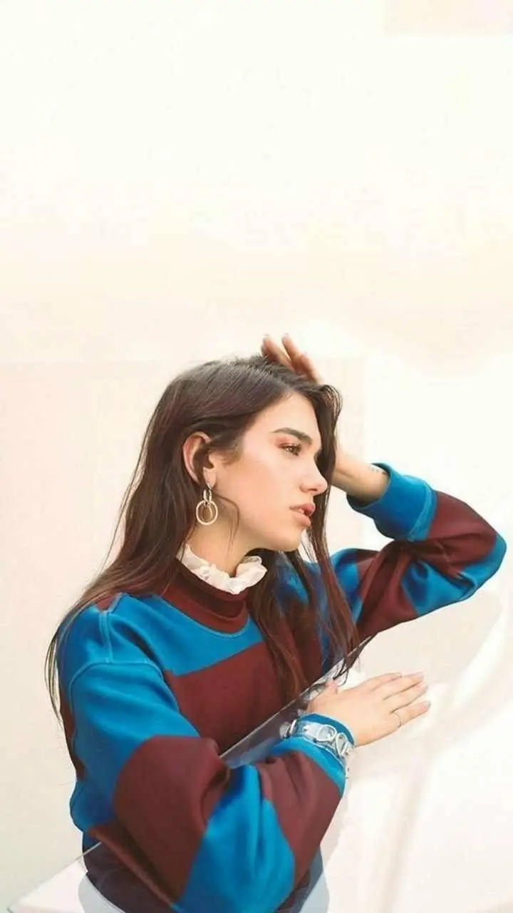 Vertical wallpaper of the famous female singer Dua Lipa