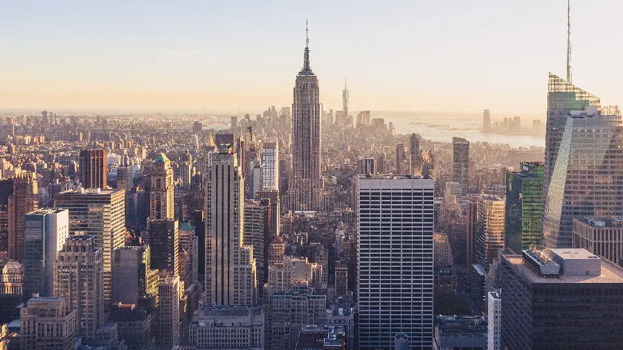 Wallpaper of the architecture of the Grace Building along with other buildings in New York with 8k architectural quality