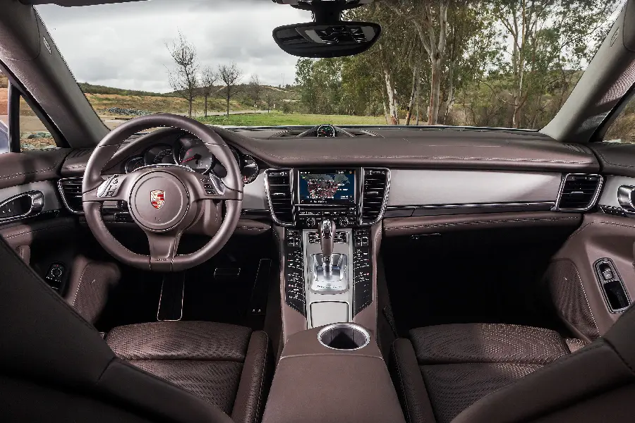 Interesting, attractive and creepy photo from inside a luxury Porsche Panamera car