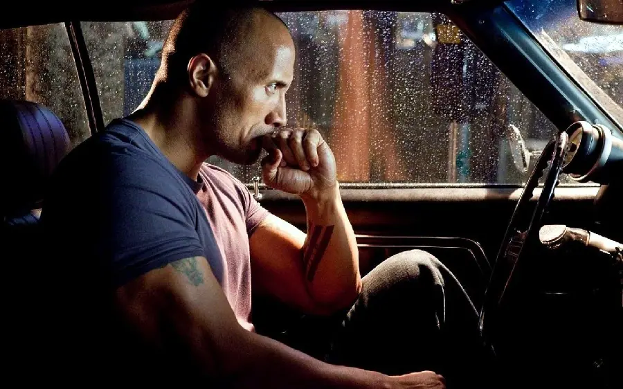 A photo of the super professional and super rich actor Dwayne Johnson