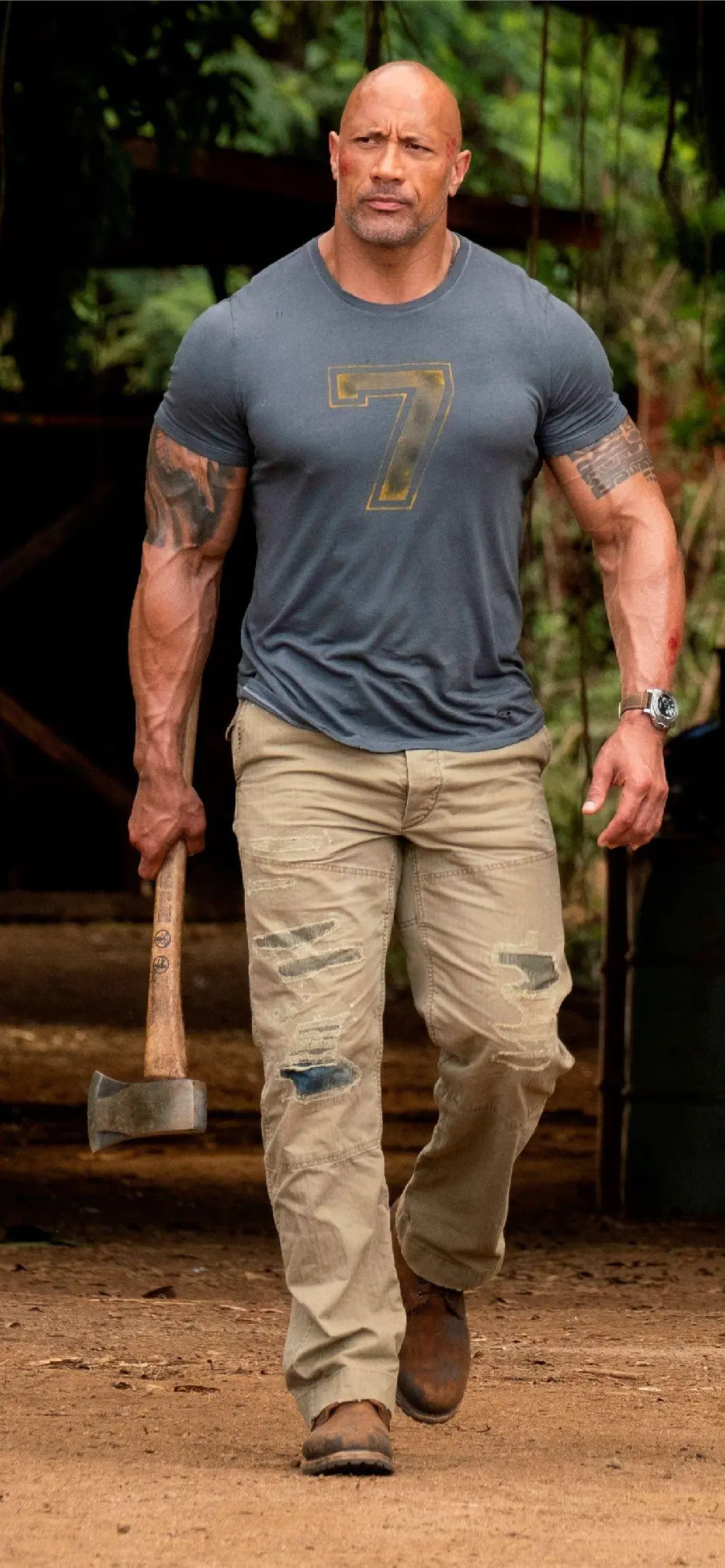 A tall picture of the Rock named Dwayne Johnson with an athletic and fit body