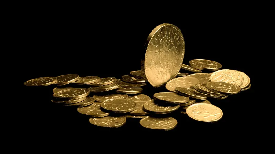Image of gold coins on a black background for computer desktop 
