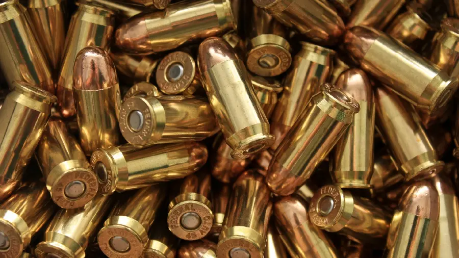 Cool and cool wallpaper of golden bullets stacked on top of each other