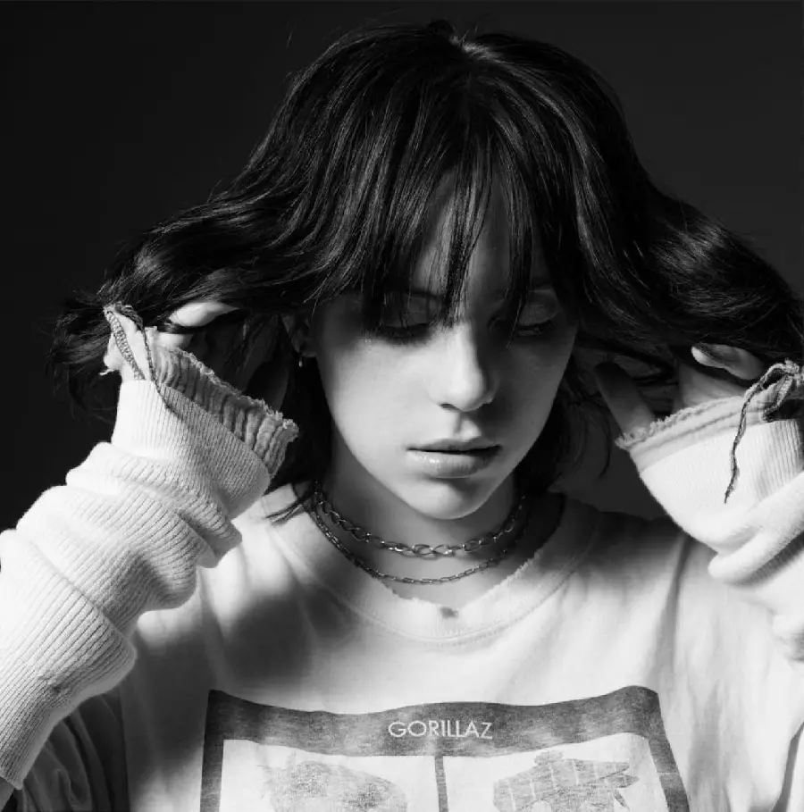 Cute and innocent black and white photo of Billie Eilish with high quality 