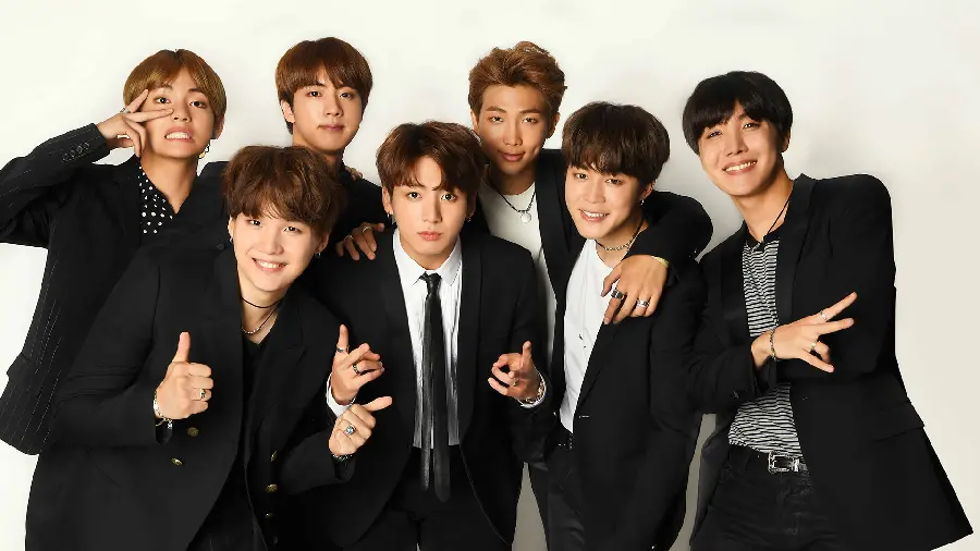 Background for Computer of Cool BTS Group with Uniform Clothes