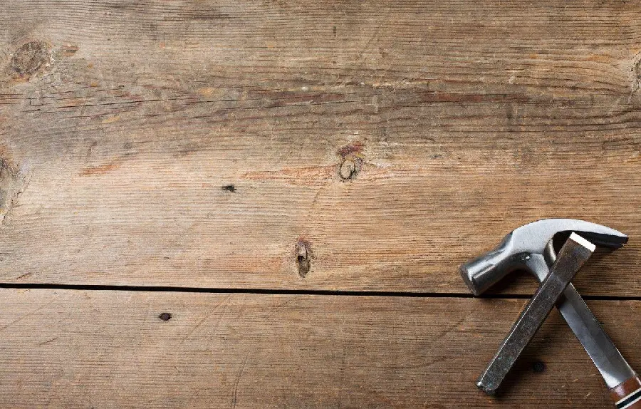 Wallpaper of nails and boards, a symbol of the widely used carpentry job