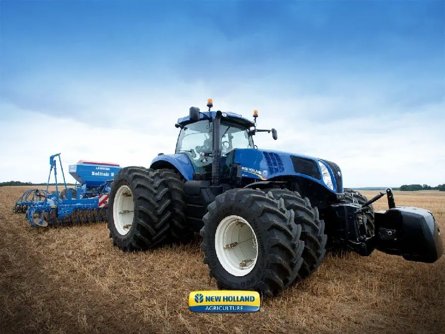 Wallpaper of a large blue tractor for agricultural work