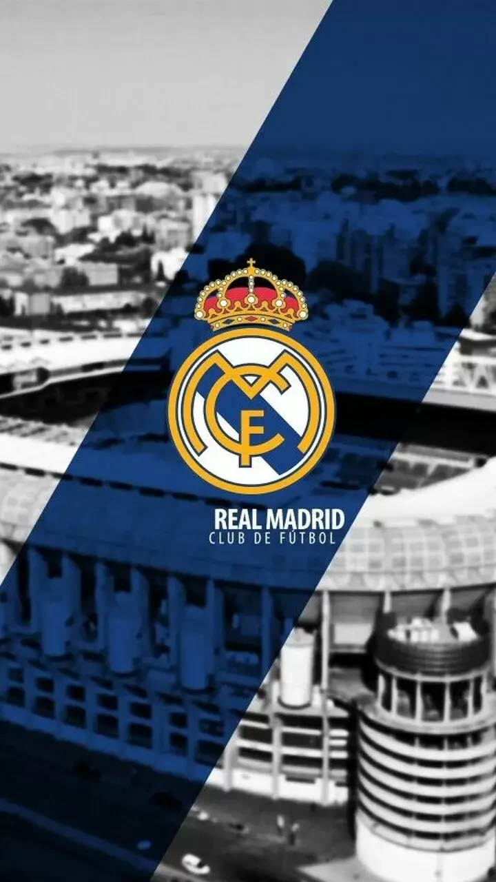 Color image of the Real Madrid logo on a black and white city background
