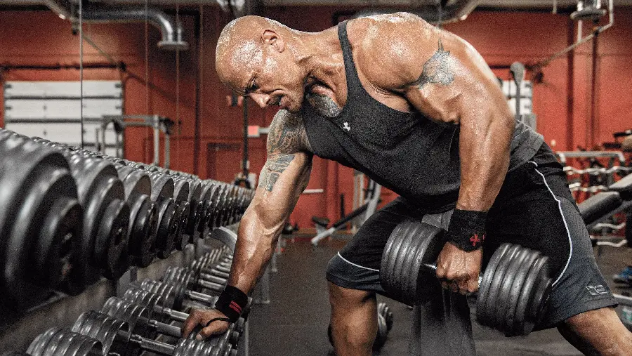 Background of Dwayne Johnson doing sports and bodybuilding exercises