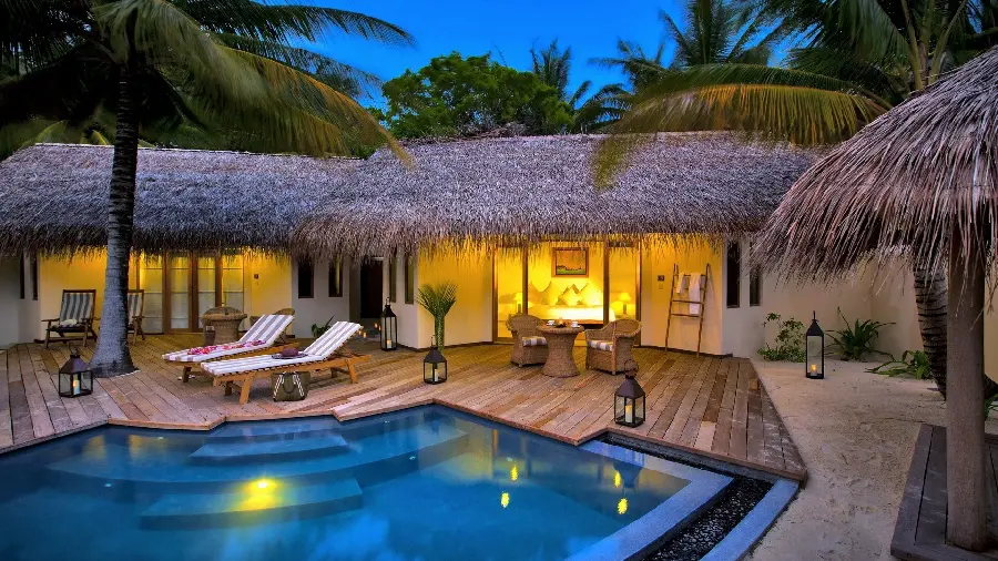 Background image and wallpaper of a luxurious summer tourist accommodation with an outdoor pool