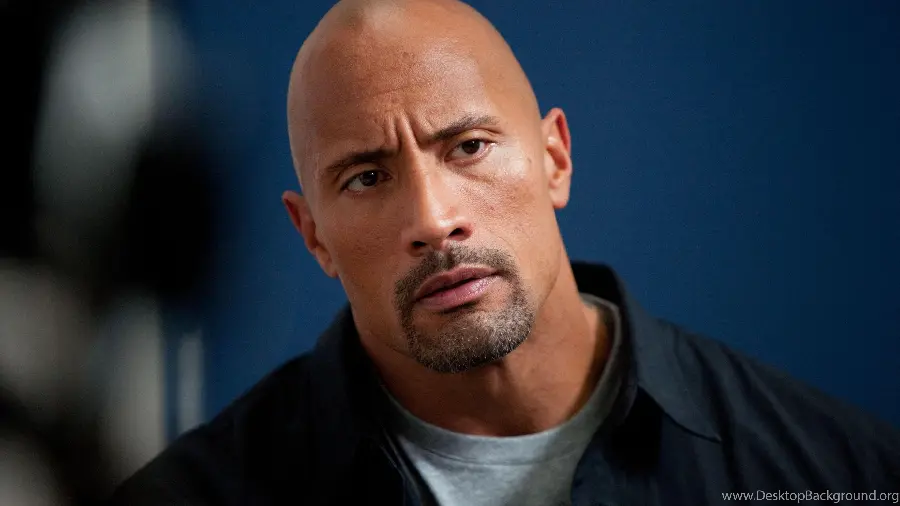A photo of the athletic face of Dwayne Johnson, nicknamed The Rock