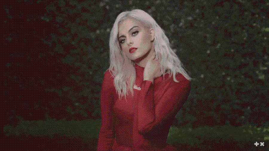Bebe Rexha with a tomato red dress at the LA concert