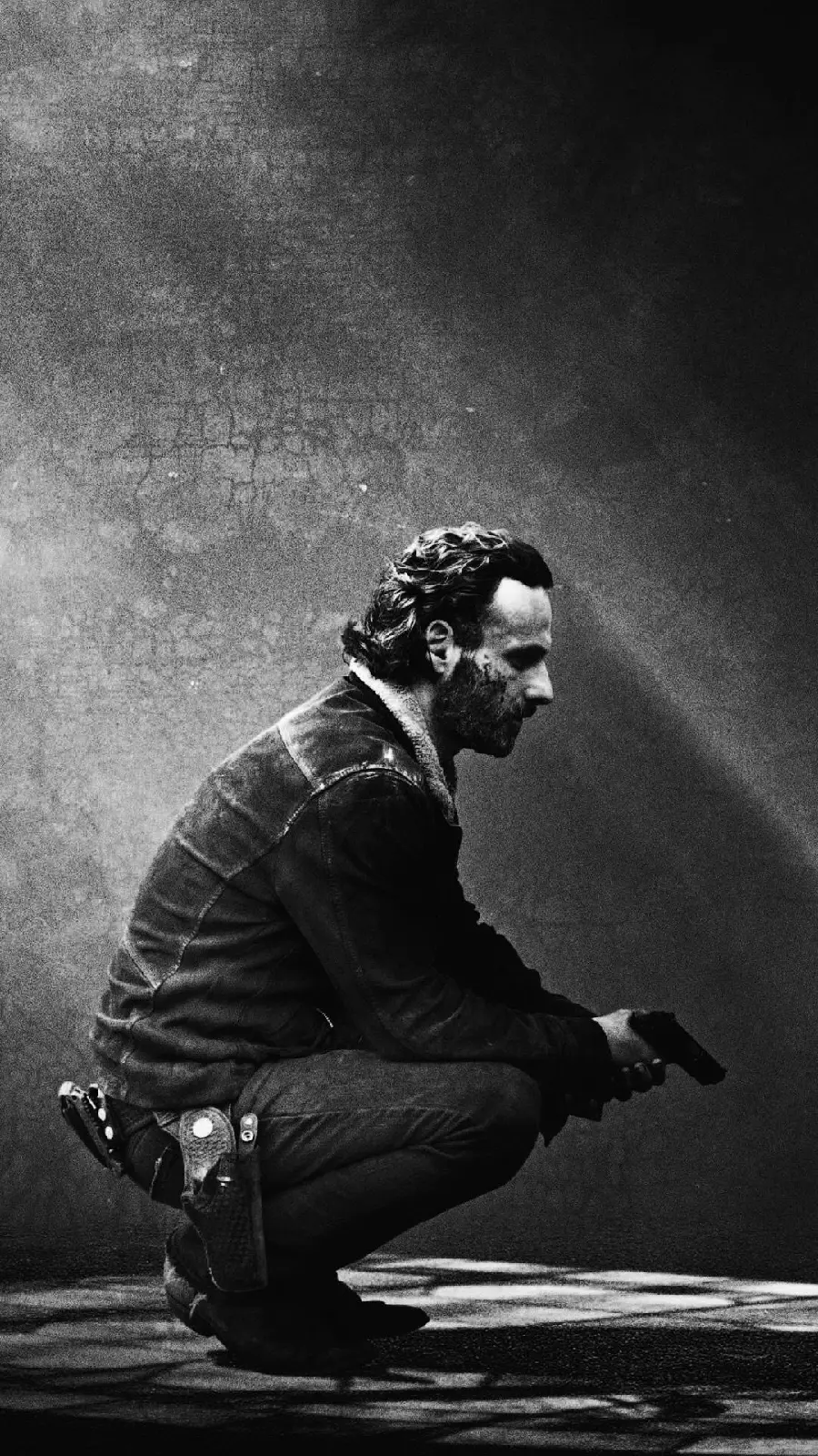 Sad and depressed black and white photo of Rick Grimes in the Walking Dead series 