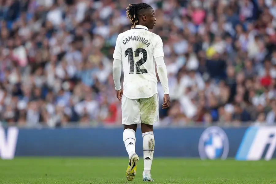Stock image of Eduardo Camavinga from the back and with the number twelve football shirt 