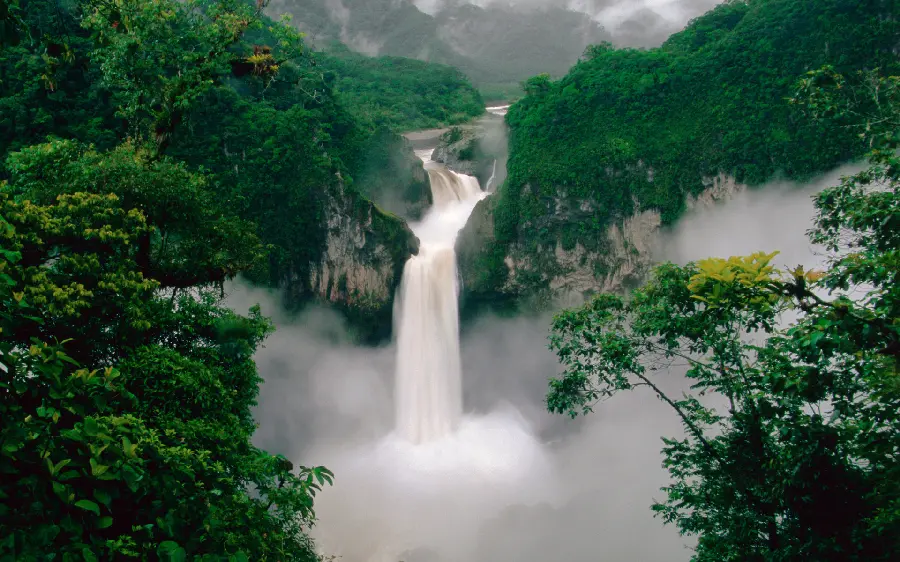 Profile of a waterfall view in the heart of a vast and lush Bazani forest