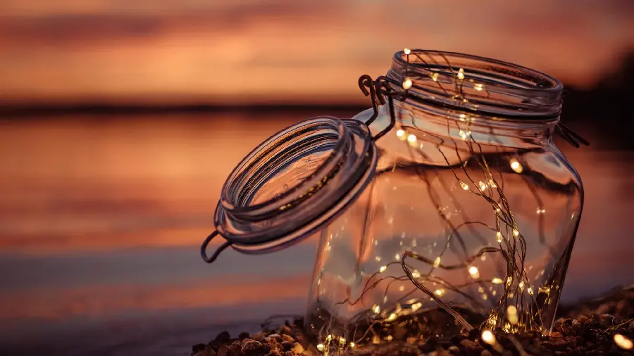 Dreamy image of a sunset with a full HD follow design and 2023