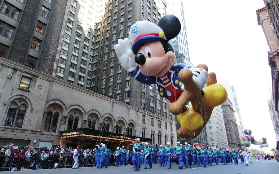 Windows Wallpaper of a Giant Mickey Mouse Doll at a Grand French Party